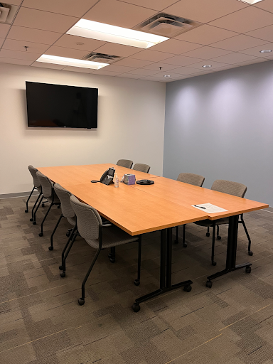 Large conference room with TV. Seats 8. 