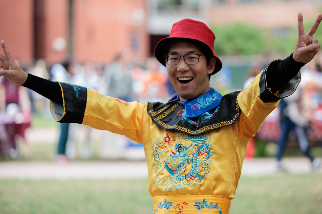 Student celebrating with an AAPI cultural performance